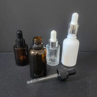 Custom Glass Slant Shoulder 1 Oz Hair Eye Essential Essence Packaging Skincare Serum Botol 30ml Frosted Dropper Botol dengan Kotak