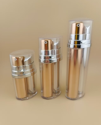 Botol pompa tanpa udara emas dan perak dengan penutup luar untuk produk kosmetik dan perawatan kulit