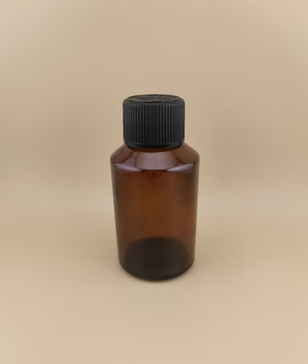 Desain Halus Botol Kaca Bulat Cokelat Bening Halus dengan Tutup Khusus untuk Obat